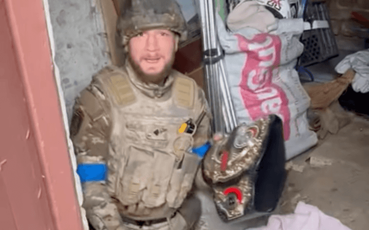 Moment Ukrainian MMA champion recovers championship belt from bombed home Moment Ukrainian MMA champion recovers championship belt from bombed home
