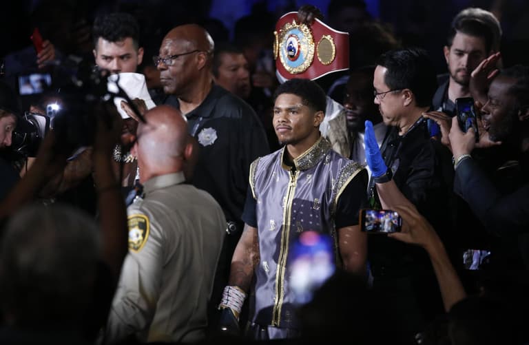 Boxer races off stage to ‘protect mother’ in post-fight brawl Boxer races off stage to ‘protect mother’ in post-fight brawl