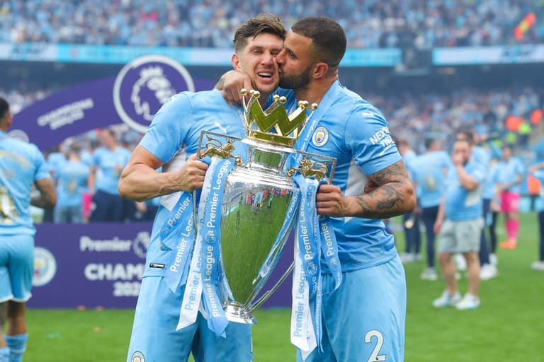 Tipsy John Stones and Kyle Walker share tender heart to heart on Man City parade Tipsy John Stones and Kyle Walker share tender heart to heart on Man City parade