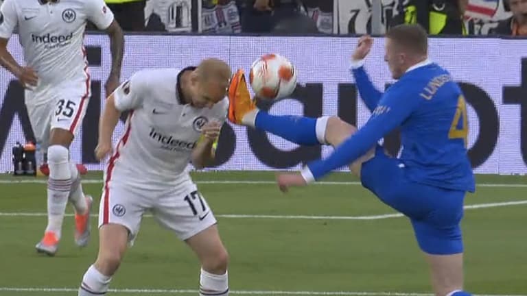 John Lundstram somehow escapes booking for reckless challenge on Sebastian Rode John Lundstram somehow escapes booking for reckless challenge on Sebastian Rode