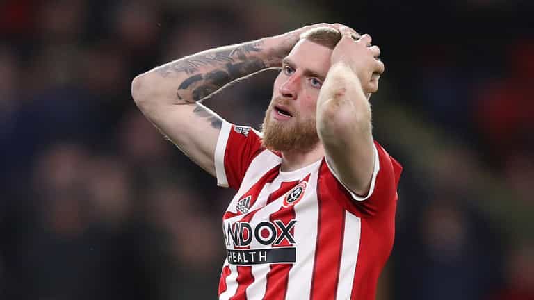 Oli McBurnie denies stamping on Forest fan despite damning video Oli McBurnie denies stamping on Forest fan despite damning video