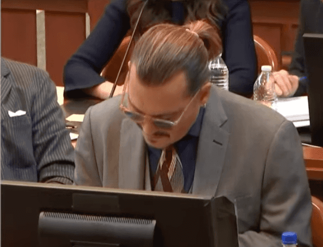 Johnny Depp smirks as court hears audio of Amber Heard call him ‘Junkie Johnny’ Johnny Depp smirks as court hears audio of Amber Heard call him ‘Junkie Johnny’