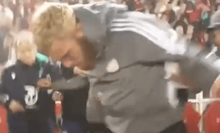 Sheffield United’s Oli McBurnie appears to stamp on fan who invaded pitch Sheffield United’s Oli McBurnie appears to stamp on fan who invaded pitch