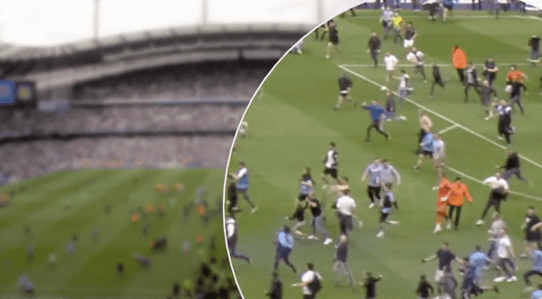 Video emerges of ‘assault’ on Robin Olsen during Man City pitch invasion Video emerges of ‘assault’ on Robin Olsen during Man City pitch invasion
