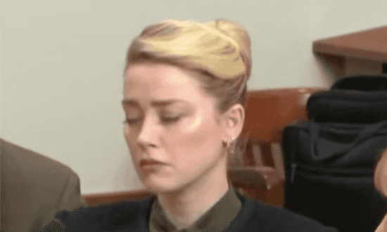 Amber Heard appears ‘distraught’ as court hears explicit Johnny Depp text message Amber Heard appears ‘distraught’ as court hears explicit Johnny Depp text message
