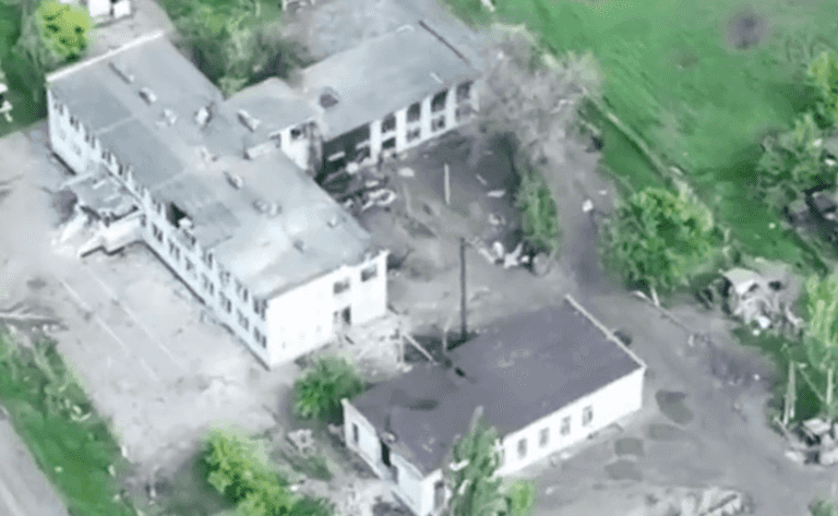 Moment Russian soldier flips the bird to Ukrainian drone before it blows up tank Moment Russian soldier flips the bird to Ukrainian drone before it blows up tank