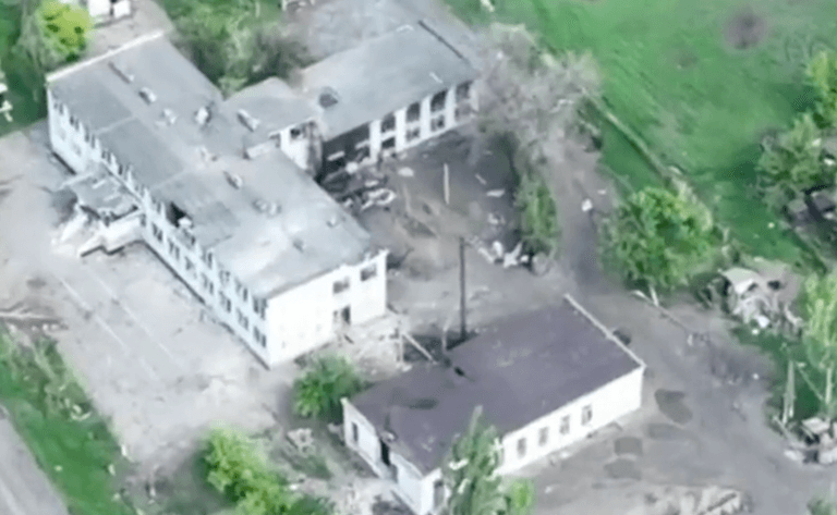Moment Russian soldier flips the bird to Ukrainian drone before it blows up tank Moment Russian soldier flips the bird to Ukrainian drone before it blows up tank