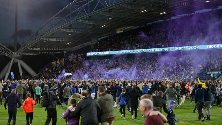 Luton boss calls pitch-invading Huddersfield fans a disgrace for taunting players Luton boss calls pitch-invading Huddersfield fans a disgrace for taunting players
