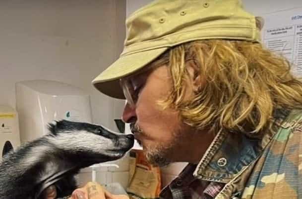 Johnny Depp wears Hillsborough badge on visit to wildlife sanctuary Johnny Depp wears Hillsborough badge on visit to wildlife sanctuary