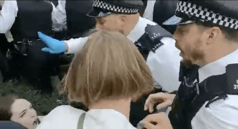 Woman ‘thrown to the ground’ and ‘stamped on’ by police as protestors stop immigration raid Woman ‘thrown to the ground’ and ‘stamped on’ by police as protestors stop immigration raid