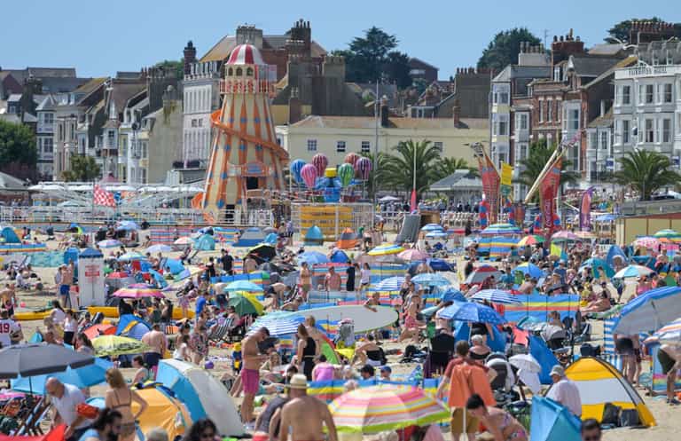 Parents warned to keep kids indoors as UK heatwave soars and health alerts issued Parents warned to keep kids indoors as UK heatwave soars and health alerts issued