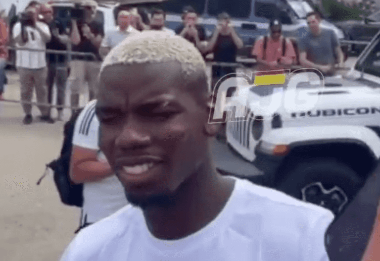 Paul Pogba refuses to sign Man United shirt as he arrives in Turin to re-sign for Juventus Paul Pogba refuses to sign Man United shirt as he arrives in Turin to re-sign for Juventus