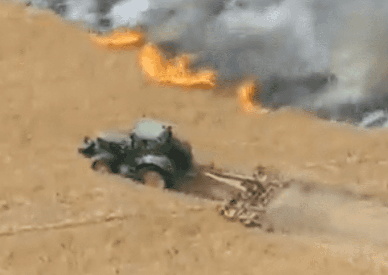 Moment heroic farmer desperately tries to slow down wildfire to save his neighbour’s home Moment heroic farmer desperately tries to slow down wildfire to save his neighbour’s home