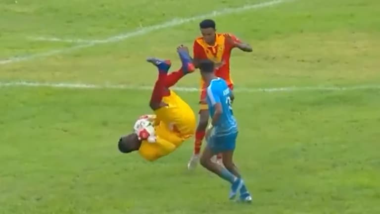 Goalkeeper avoids red card for crazy somersault kick on opponent Goalkeeper avoids red card for crazy somersault kick on opponent