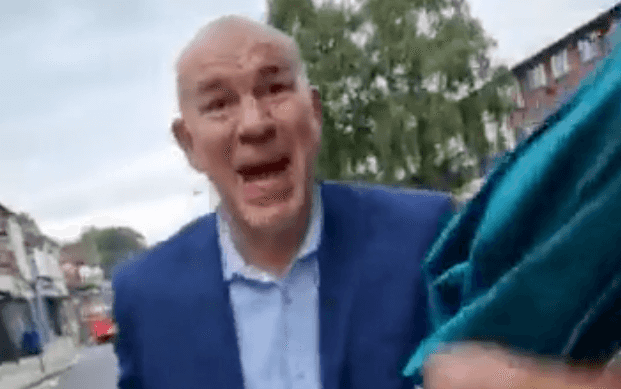 Video shows man launch ‘racist attack armed with umbrellas after first starting on homeless man’ Video shows man launch ‘racist attack armed with umbrellas after first starting on homeless man’