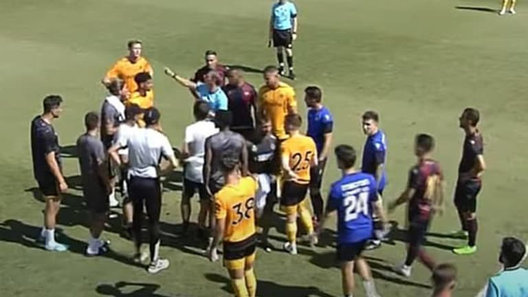 Four players sent off in first half as Wolves pre-season friendly descends into chaos Four players sent off in first half as Wolves pre-season friendly descends into chaos