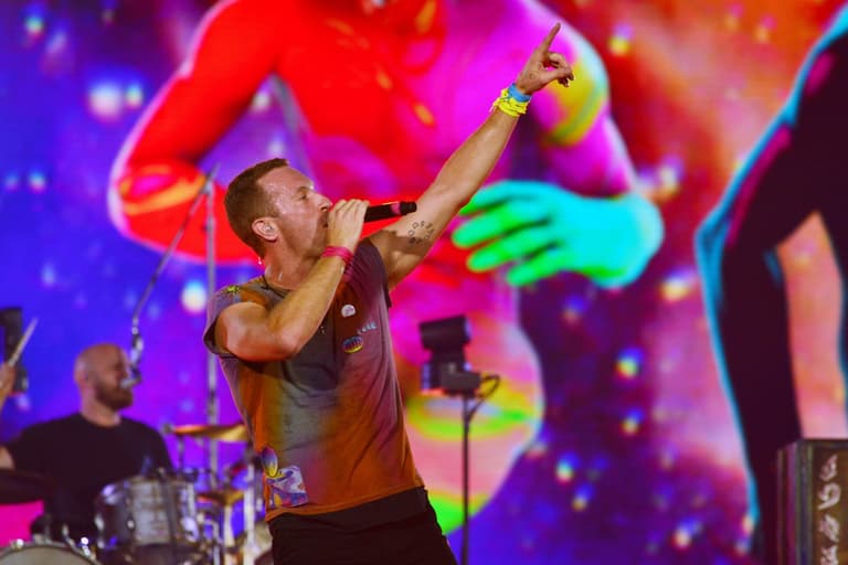 Alan Partridge dons Snow Patrol jacket as he joins Coldplay on stage at Wembley Alan Partridge dons Snow Patrol jacket as he joins Coldplay on stage at Wembley