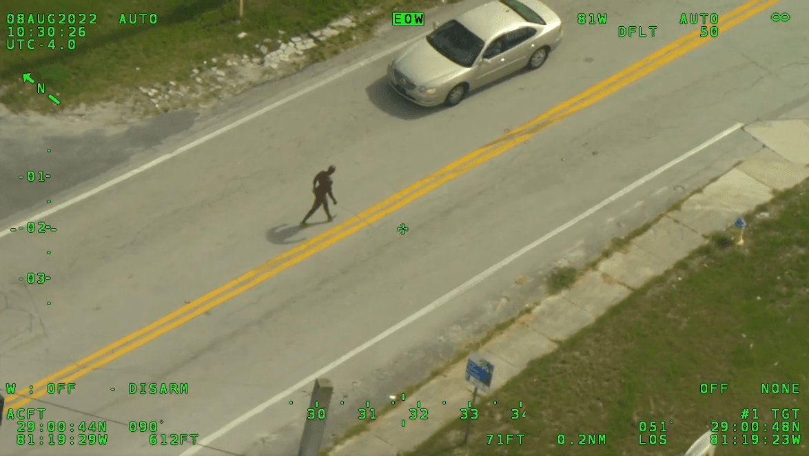 Naked offender armed with a machete tries to rob man of his clothing in incident captured on CCTV