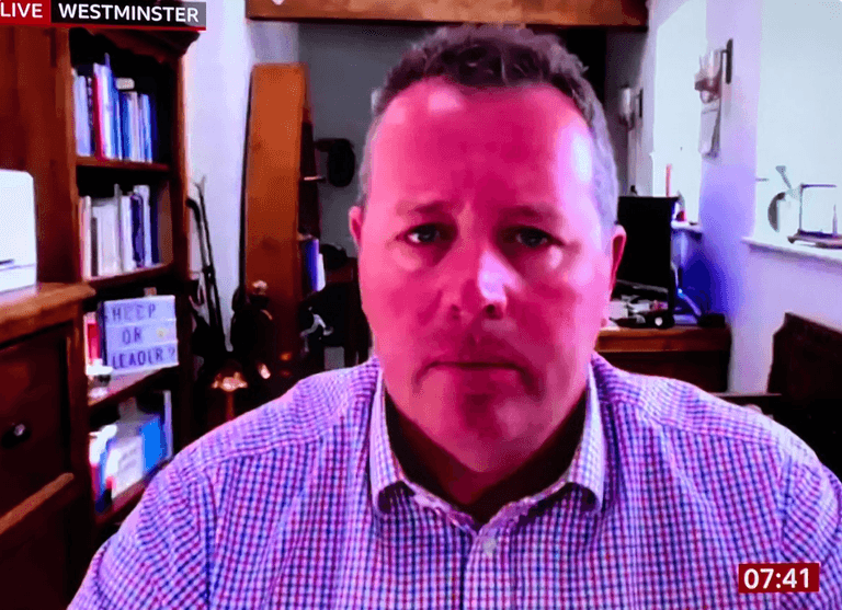 Tory leader in shambolic BBC interview saved by even more embarrassing sign on his bookshelf Tory leader in shambolic BBC interview saved by even more embarrassing sign on his bookshelf