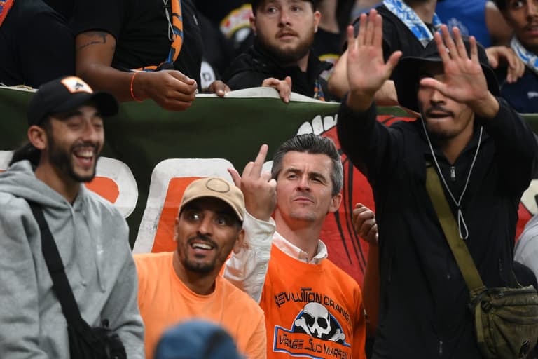 Joey Barton gives middle finger to Spurs fans after being spotted amongst Marseille fans Joey Barton gives middle finger to Spurs fans after being spotted amongst Marseille fans
