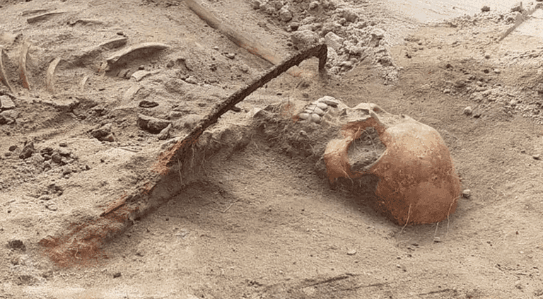Remains of ‘vampire’ discovered pinned down with sickle across throat Remains of ‘vampire’ discovered pinned down with sickle across throat
