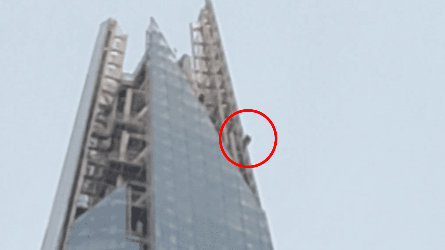 Topless man spotted free climbing to the top of The Shard