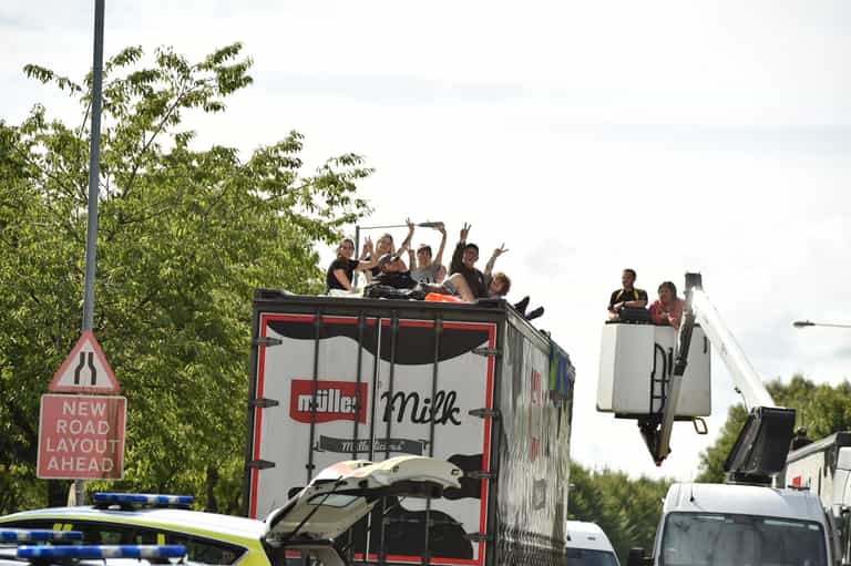 Vegan activists superglue themselves to Muller lorries to make a point Vegan activists superglue themselves to Muller lorries to make a point