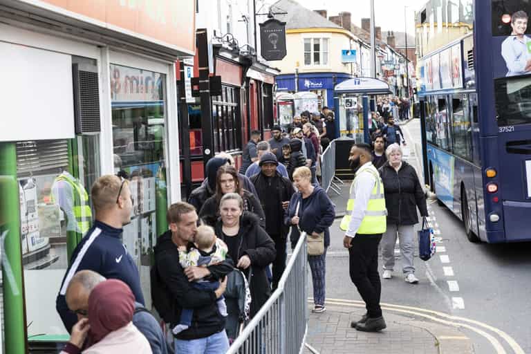 Hundreds of people queue after fish and shop serve portions for just 45p Hundreds of people queue after fish and shop serve portions for just 45p
