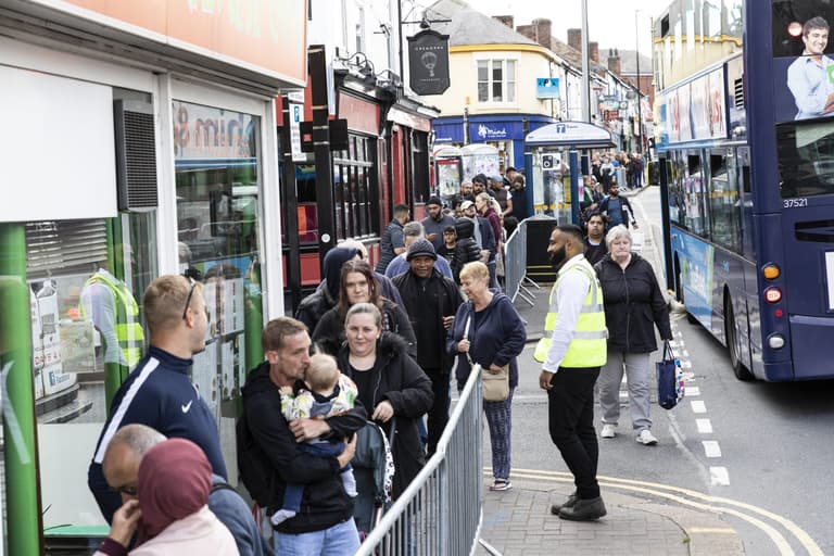 Hundreds of people queue after fish and shop serve portions for just 45p Hundreds of people queue after fish and shop serve portions for just 45p