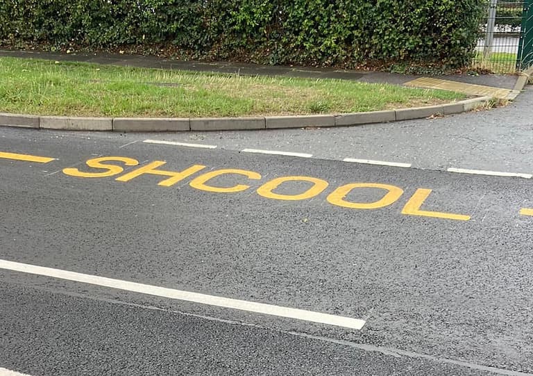 Too cool for shcool: Road marking painters have a mare Too cool for shcool: Road marking painters have a mare