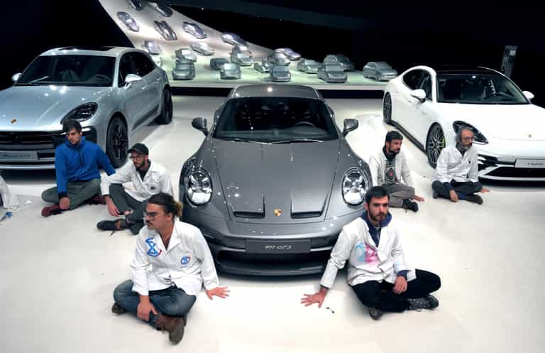 Climate activists glue themselves to floor of car dealership – but complain when staff turn off the lights and go home Climate activists glue themselves to floor of car dealership – but complain when staff turn off the lights and go home
