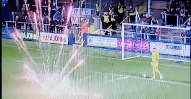 Barrow vs Carlisle temporarily suspended after firework thrown on pitch Barrow vs Carlisle temporarily suspended after firework thrown on pitch