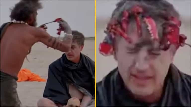 Reporter forced to eat human brain with cannibal tribe while wearing crown made out of teeth Reporter forced to eat human brain with cannibal tribe while wearing crown made out of teeth
