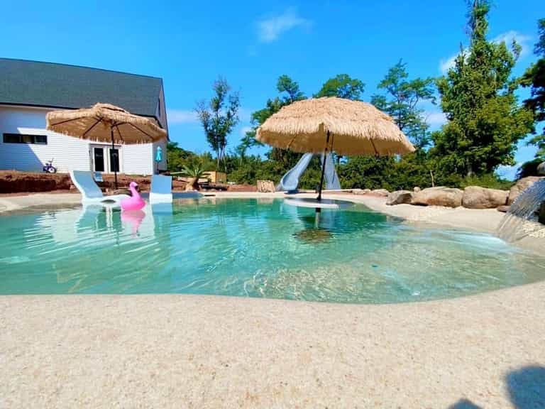 Mum creates private beach in her landlocked back garden for £134k Mum creates private beach in her landlocked back garden for £134k
