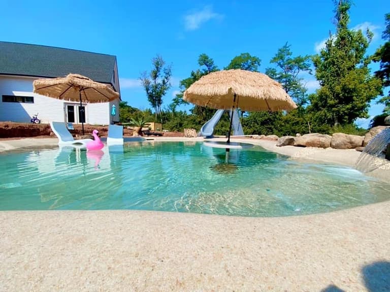 Mum creates private beach in her landlocked back garden for £134k Mum creates private beach in her landlocked back garden for £134k