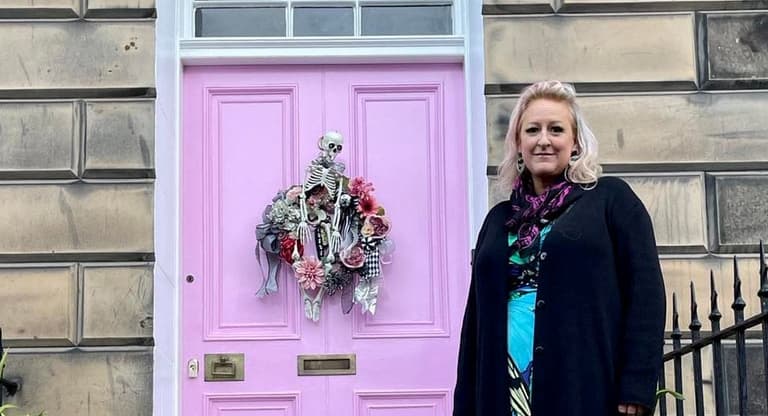 Woman told to change the colour of her pink front door or face £20,000 fine Woman told to change the colour of her pink front door or face £20,000 fine