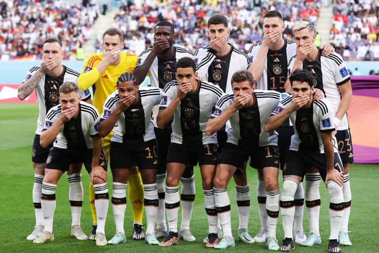 Germany players cover their mouths during team photo in FIFA protest Germany players cover their mouths during team photo in FIFA protest