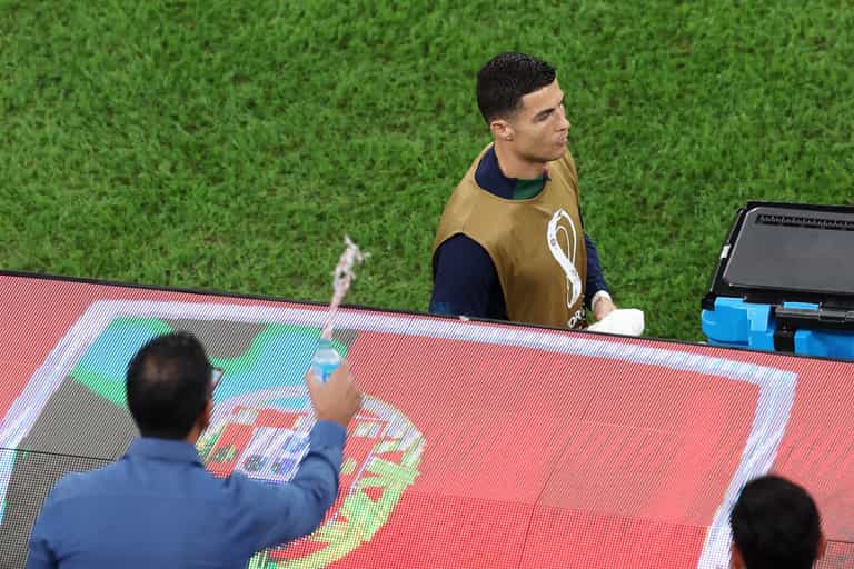 Fan thrown out of stadium for throwing water at Cristiano Ronaldo Fan thrown out of stadium for throwing water at Cristiano Ronaldo