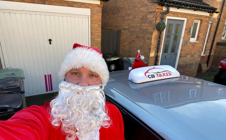 Cabbie slams council killjoys for banning him from wearing a Santa beard while driving Cabbie slams council killjoys for banning him from wearing a Santa beard while driving