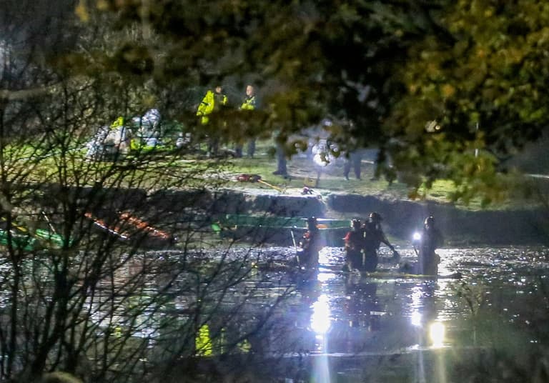 Three children die after falling through ice while playing on Solihull frozen lake Three children die after falling through ice while playing on Solihull frozen lake