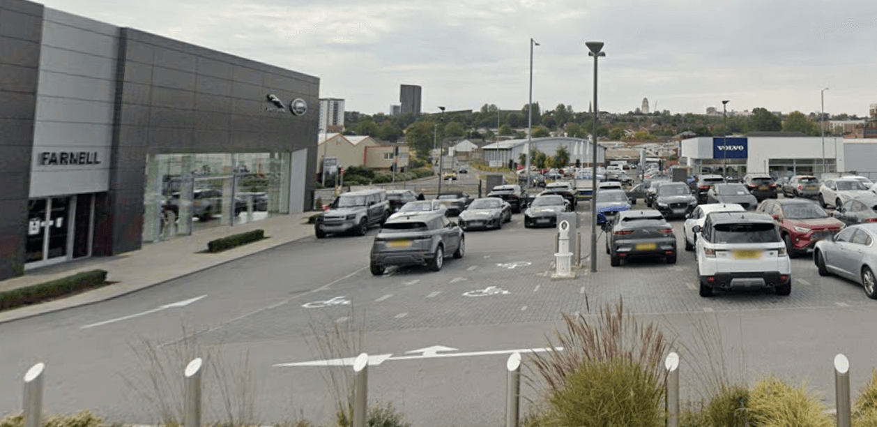 Woman and child killed after Audi crashes into Jaguar dealership in Leeds