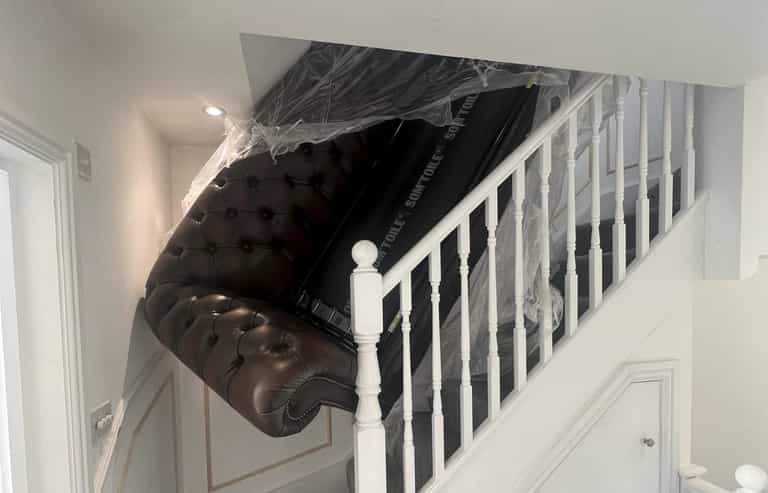 Homeowners furious after delivery men leave brand new sofa wedged in staircase Homeowners furious after delivery men leave brand new sofa wedged in staircase