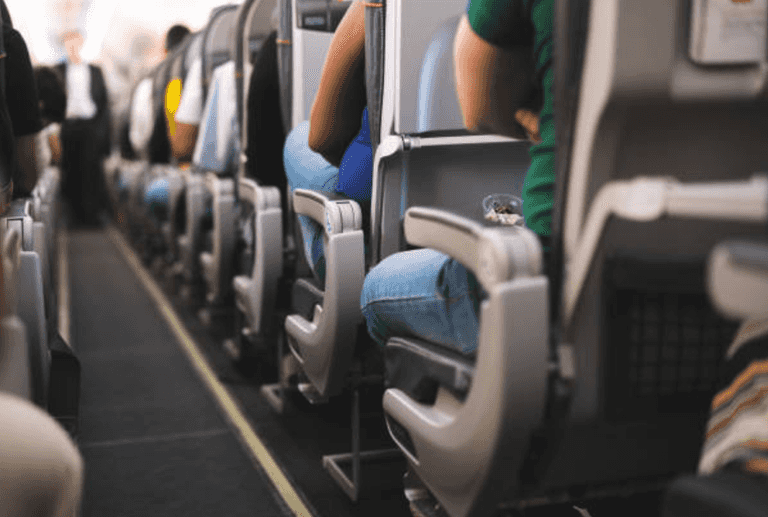 Passenger says she was cursed out all flight after refusing to switch seats with family Passenger says she was cursed out all flight after refusing to switch seats with family
