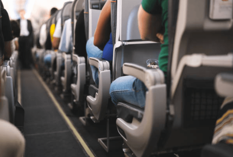 Passenger says she was cursed out all flight after refusing to switch seats with family Passenger says she was cursed out all flight after refusing to switch seats with family