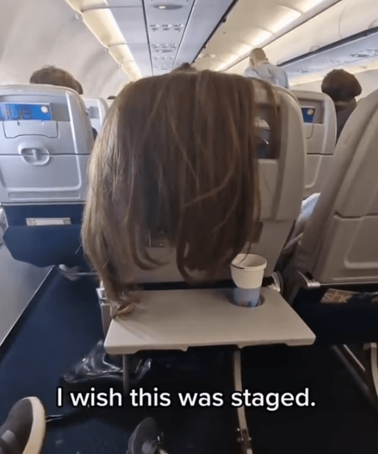 Woman left stunned after plane passenger drapes hair over back of her seat Woman left stunned after plane passenger drapes hair over back of her seat