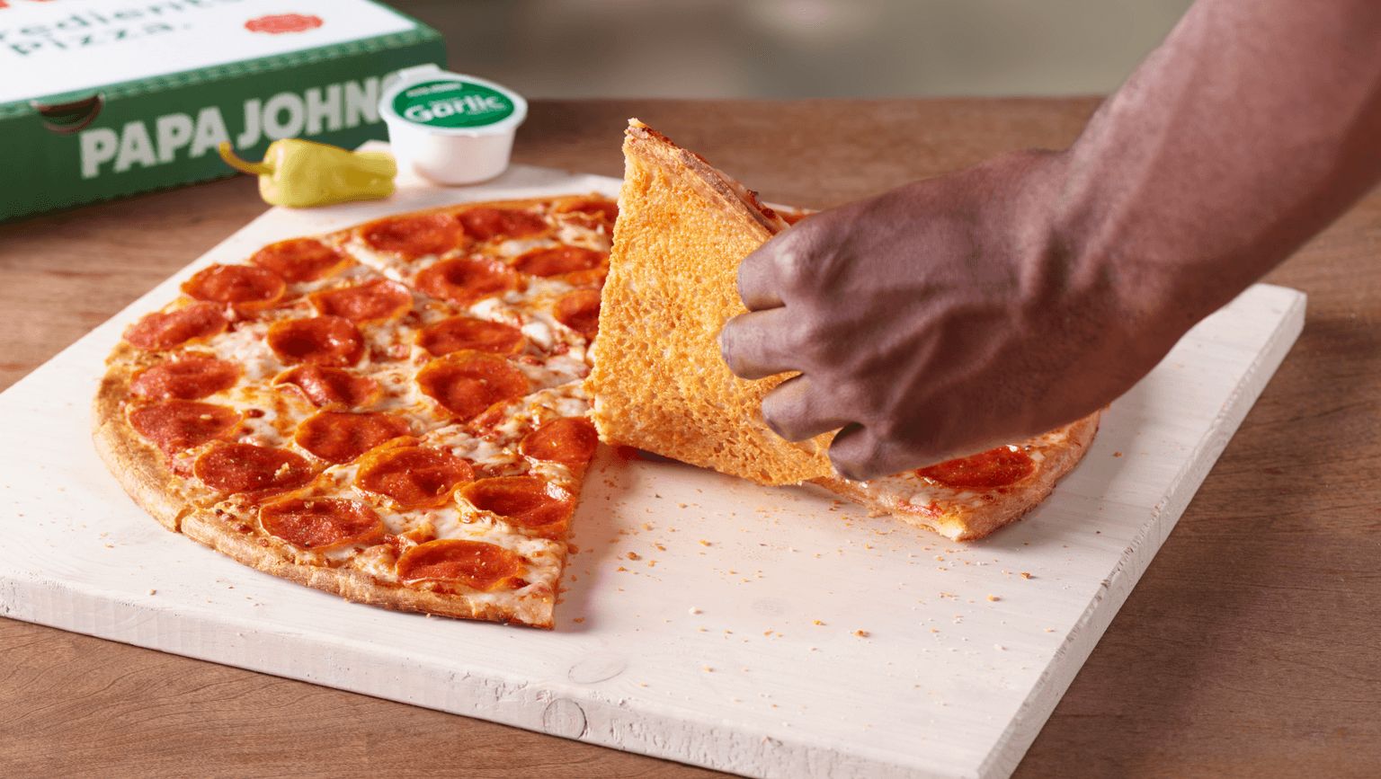 Papa Johns unveils new pizza with cheese underneath the base