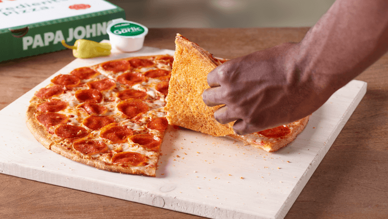 Papa Johns unveils new pizza with cheese underneath the base Papa Johns unveils new pizza with cheese underneath the base