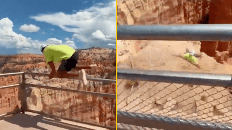 Man jumps over barrier at 800ft canyon for prank then slips in terrifying video Man jumps over barrier at 800ft canyon for prank then slips in terrifying video