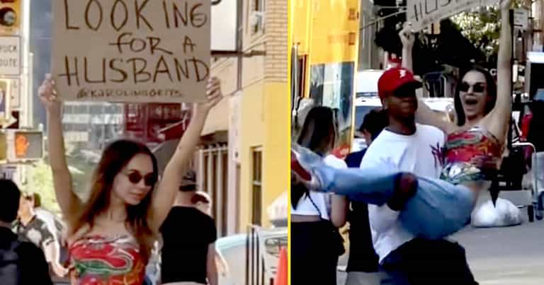 Woman sick of dating apps takes to streets with cardboard ‘looking for a husband’ sign Woman sick of dating apps takes to streets with cardboard ‘looking for a husband’ sign