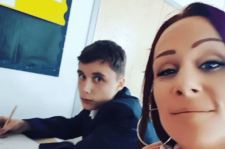 Mum turns up and sits next to son in class to stop him being rude to teachers Mum turns up and sits next to son in class to stop him being rude to teachers